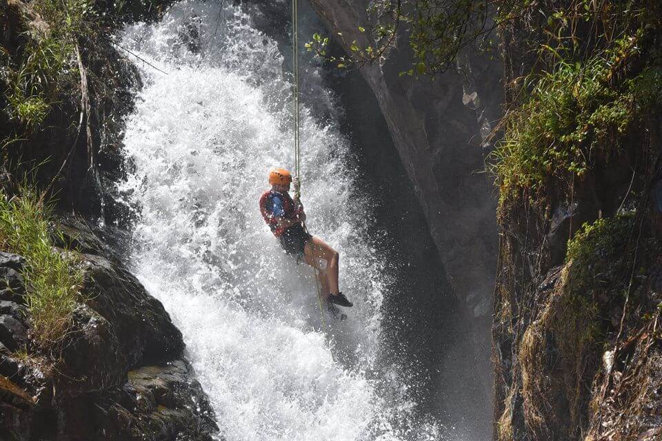 The first challenge of the trip is a cliff beside a waterfall about 10 meters high